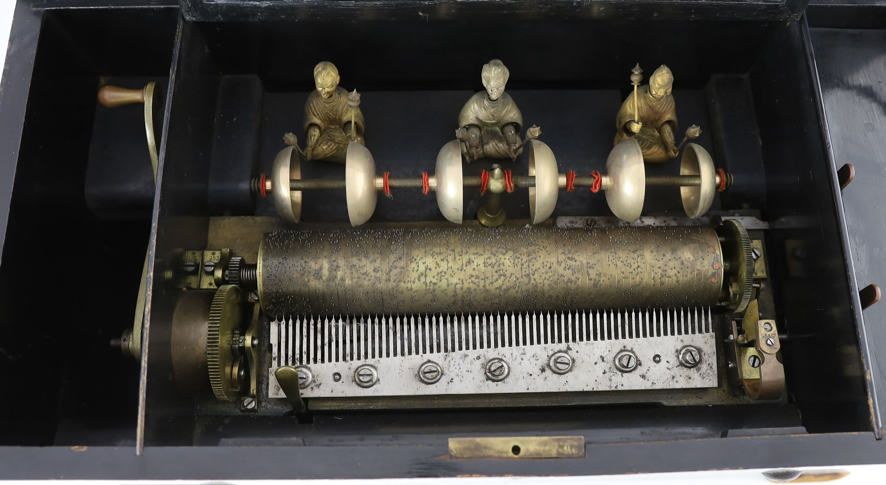 A 19th century Swiss ten air inlaid walnut musical box, width 60cm, depth 31cm, height 26cm